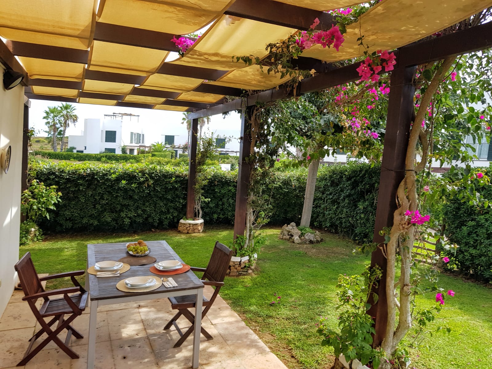 Villa Sa Calma Esventada - Zona del jardín  - Villa con piscina comunitaria - Arenal den Castell - Menorca